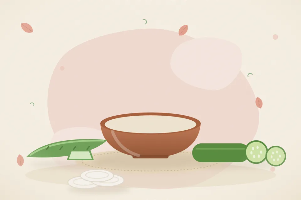 Fresh aloe vera gel and grated cucumber mashed together in a small bowl on a marble slab