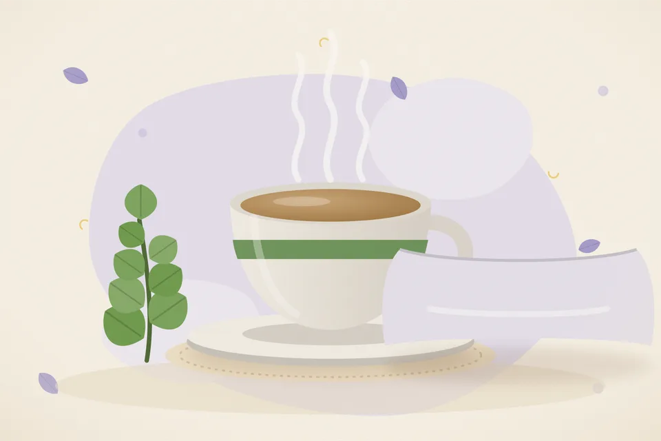 A clay cup of pale tea, a few green brahmi leaves, and a small pot of water on a quiet kitchen counter.