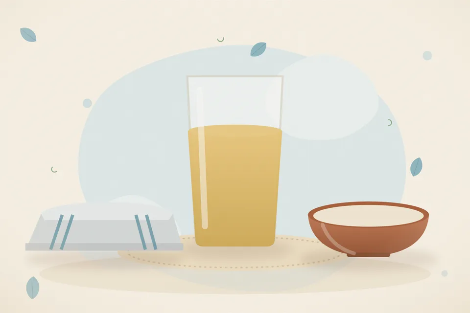 Tender guava leaves in a small pan of water, a pinch of salt in a dish, and an empty cup on the counter.