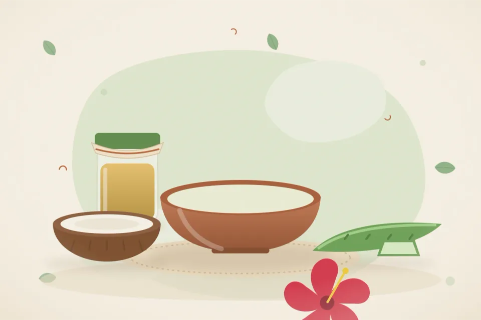 Half coconut, a bowl of curd with aloe vera gel, hibiscus flower and a jar of oil on a leaf-green background