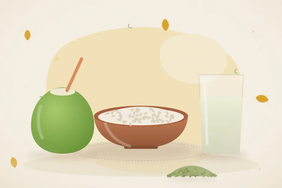 Green coconut, a bowl of curd rice, a glass of fennel water and fennel seeds on a turmeric-yellow background