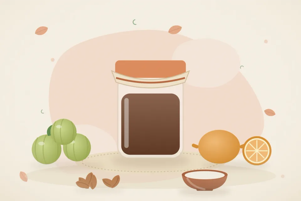 Bowl of curd, amla fruits, oranges, a small jar of chyawanprash and almonds on a soft peach background