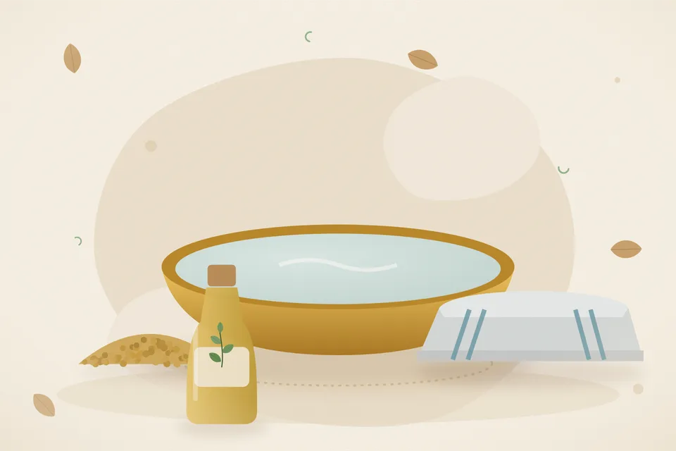 Soaked fenugreek seeds, a stone mortar and a folded cotton cloth on a brass plate
