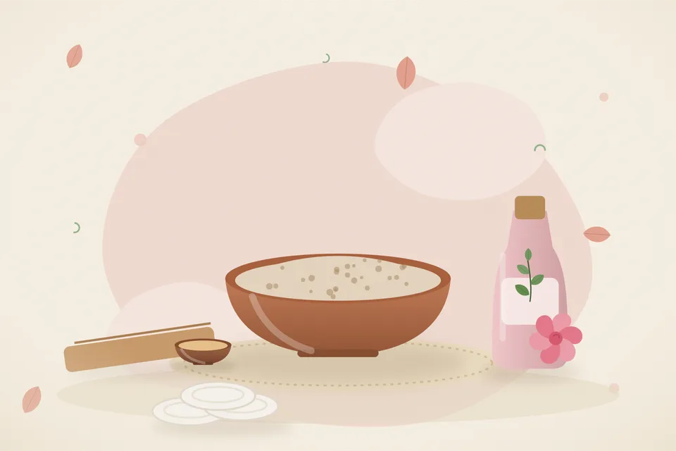 Kitchen still life of sandalwood powder in a bowl, raw milk in a glass, and rose water in a small dish on wood, with no people and no text.