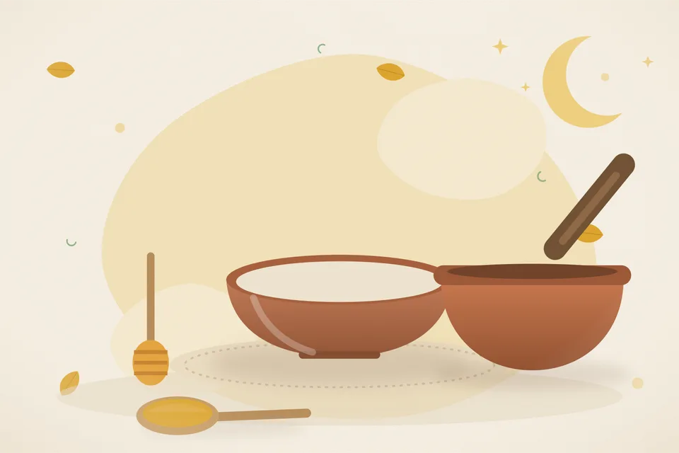 A small mound of triphala powder, one drop of honey on a spoon and a pea-sized ball on a brass plate