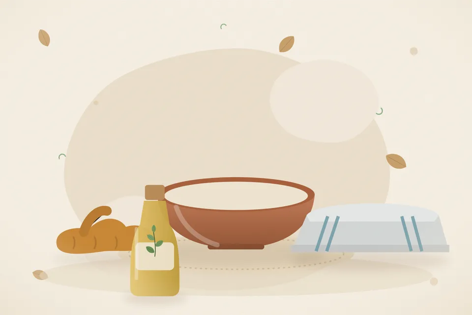 A pinch of turmeric, a teaspoon of ghee in a brass spoon and a cotton square on a wooden board