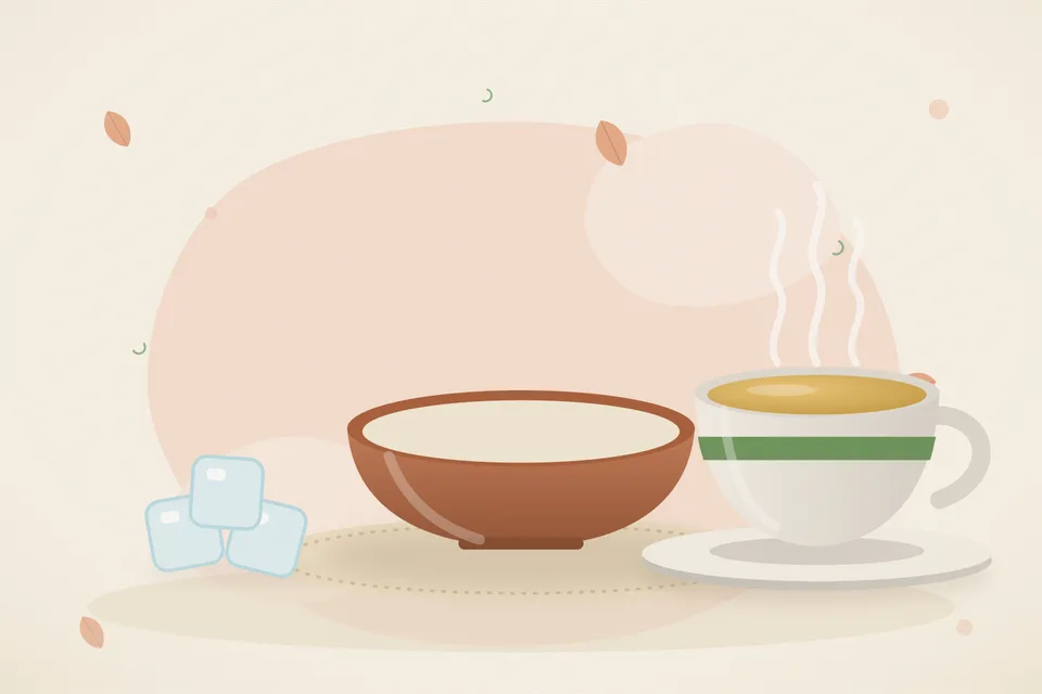 A small bowl of very soft mashed rice with a few drops of ghee on a kitchen table, beside a tiny ghee spoon. No honey jar.